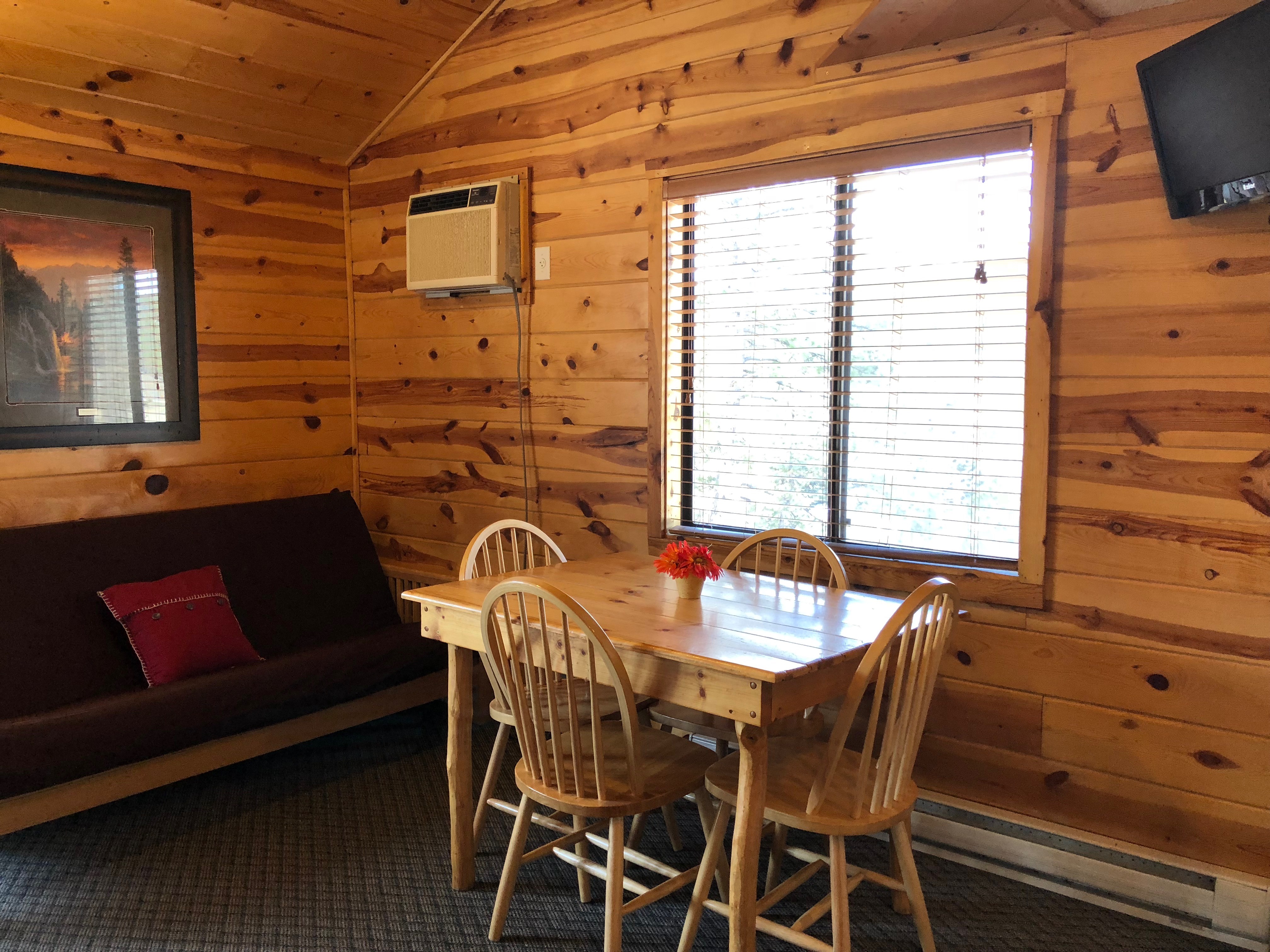 table and couch in the lodge