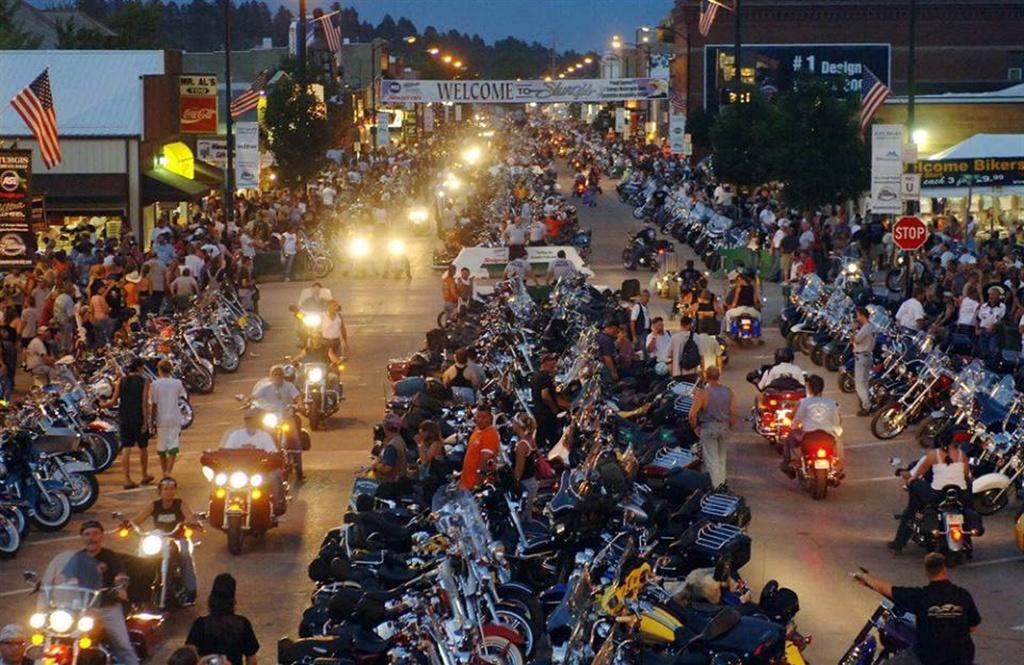 a lot of motorcycles on a road